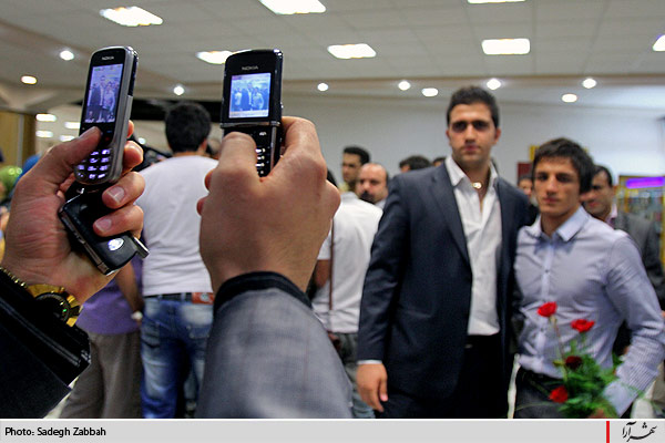 استقبال از قهرمانان كشتي جهان در فرودگاه مشهد