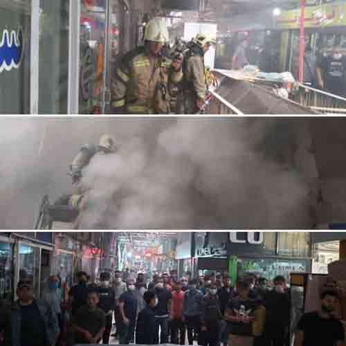 آتش‌سوزی در ساختمان تجاری در تهران + عکس