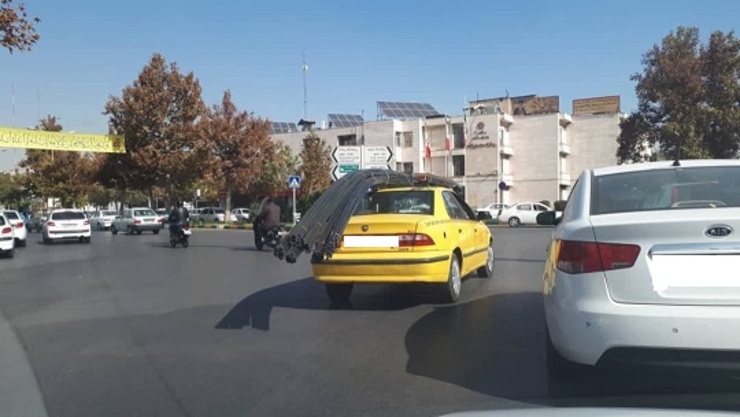 شهروند خبرنگار| حمل بار غیرمحاز با تاکسی در سطح شهر مشهد