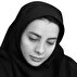 تبر در دست گل فروش