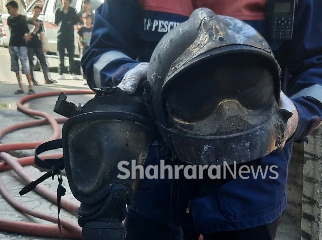 کلاه ایمنی و ماسک شهید آتش نشان رضا فخریان