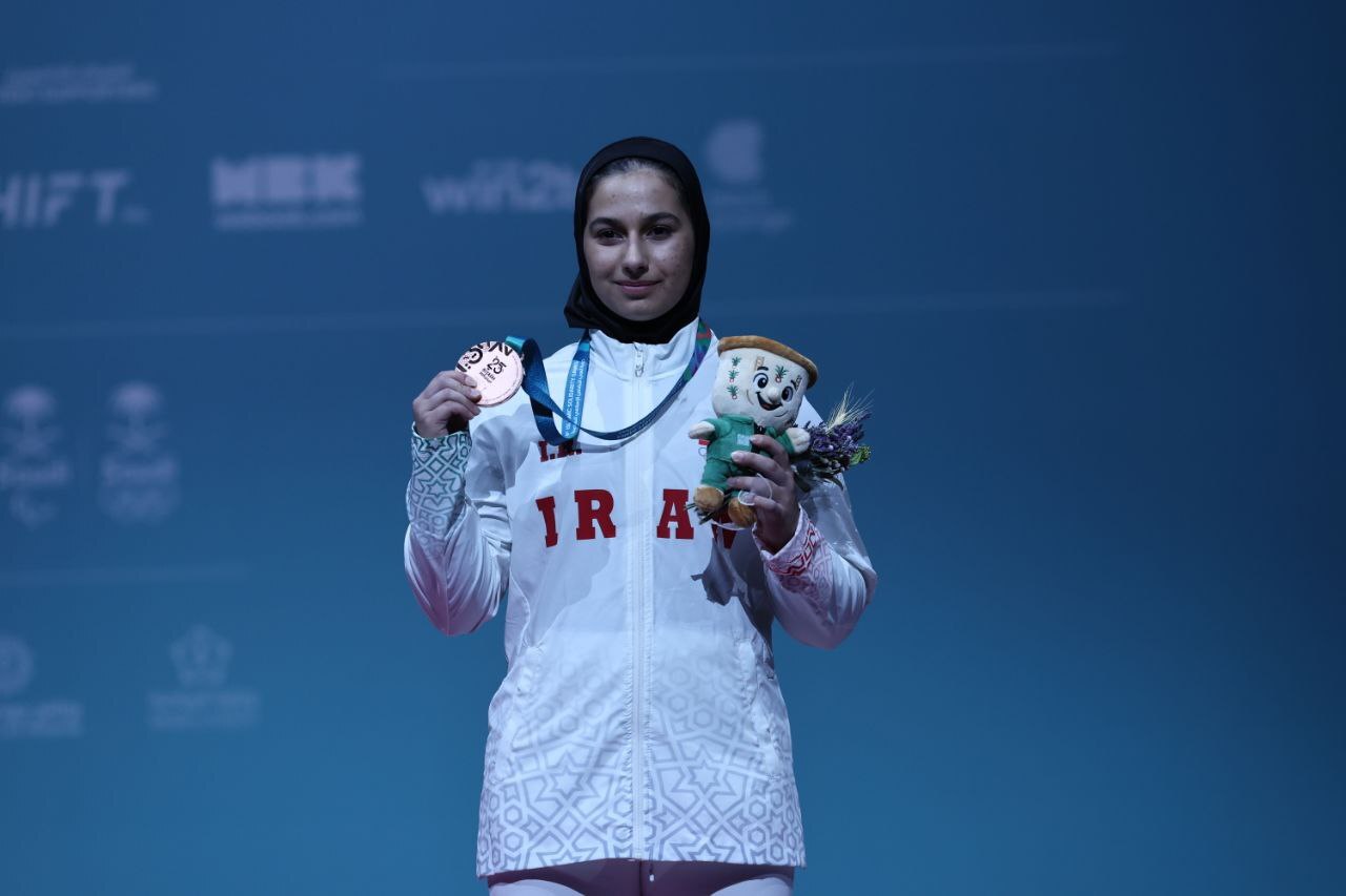 عکس های ریحانه کریمی وزنه‌بردار