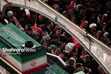 گزارش تصویری رویترز از مراسم باشکوه تشییع و خاکسپاری رهبر شهید در مشهد