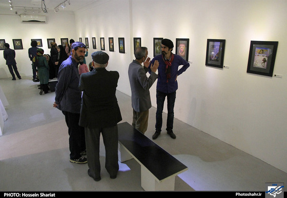 گزارش  تصویری | "دو نفر و نصفی" نمایشگاه کارتون های رضا جنگی | عکس : حسین شریعت