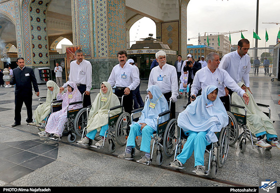 گزارش تصویری | تشرف گروهی از معلولین به حرم مطهر رضوی | عکس : نیما نجف زاده | شهرآرا