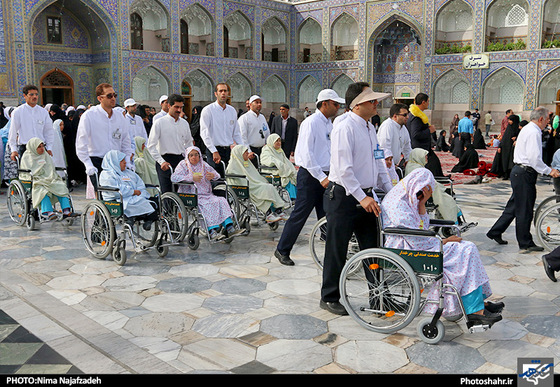 گزارش تصویری | تشرف گروهی از معلولین به حرم مطهر رضوی | عکس : نیما نجف زاده | شهرآرا
