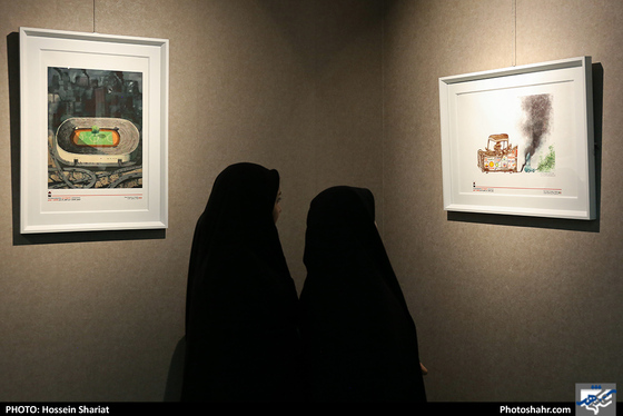 افتتاح نمایشگاه آثار دومین جشنواره بین المللی کارتون جامعه ایمن - عکس: حسین شریعت / شهرآرا
