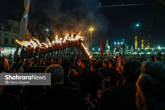 گزارش تصویری | آیین مشعل گردانی نجفی های مقیم مشهد در شب عاشورا