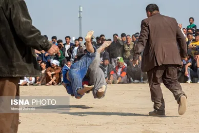 مسابقات کشتی سنتی افغانستانی‌ها به مناسبت نوروز در قم