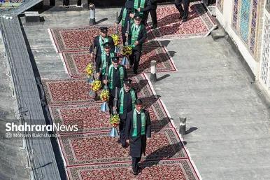 مراسم تعویض پرچم گنبد و پوش ضریح حرم مطهر ثامن الحجج (ع)