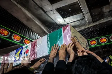 مراسم تدفین پیکر مطهر سه شهید گمنام در میدان شهدا مشهد