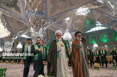 مراسم تعویض پرچم گنبد و پوش ضریح حرم مطهر ثامن الحجج (ع)