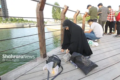 جشنواره ماهیگیری در رود پارک مشهد