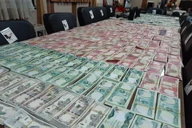 کشف دلار&zwnj;های جعلی در تهران