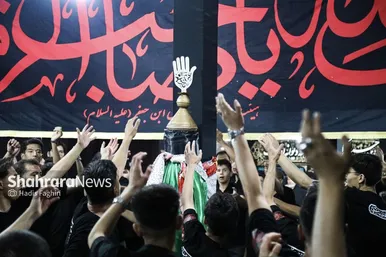 گزارش تصویری | مراسم علم کشیِ مهاجران افغانستانی در گلشهر مشهد
