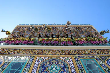 مراسم تعویض پرچم گنبد و پوش ضریح حرم مطهر ثامن الحجج (ع)