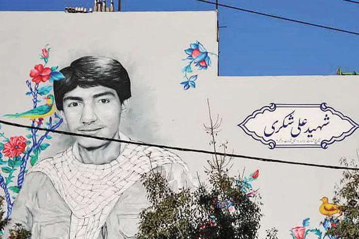 رونمایی از نقاشی دیواری شهید فوتبالیست