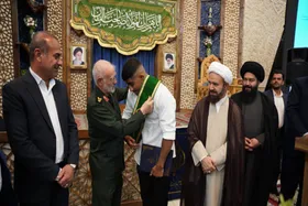 ویدئو | قهرمان کشتی جهان، خادم افتخاری حرم مطهر شاهچراغ(ع) شد