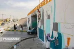 مشهد با نصب نماد‌ها و نشانه‌های هنری برای نوروز ۱۴۰۰ آماده می‌شود + تصاویر