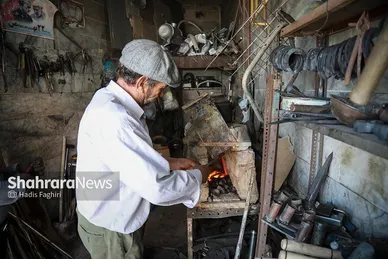 عزیزِ آهنگر
