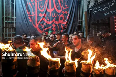 تصاویری از آئین سنتی مشعل گردانی نجفی‌های مقیم مشهد