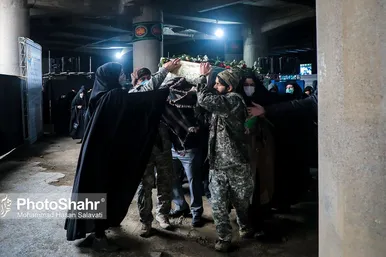 مراسم تدفین پیکر مطهر سه شهید گمنام در میدان شهدا مشهد