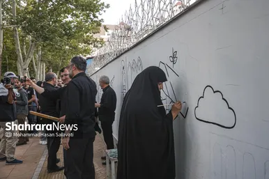 گزارش تصویری | اجرای دیوار نگاره «قوموا لله» با حضور هنرمندان بین المللی در مشهد