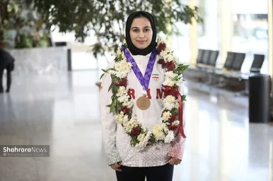 گزارش تصویری | استقبال از بانوی افتخار آفرین مشهدی در مسابقات آسیایی