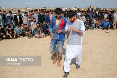 مسابقات کشتی سنتی افغانستانی‌ها به مناسبت نوروز در قم
