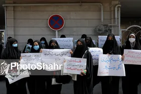 دختران مشهد در کنار خواهران افغانستانی خود ایستاده&zwnj;اند + عکس