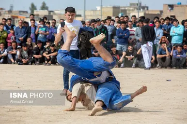 مسابقات کشتی سنتی افغانستانی‌ها به مناسبت نوروز در قم
