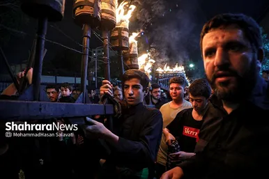 تصاویری از آئین سنتی مشعل گردانی نجفی‌های مقیم مشهد