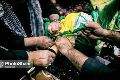 مراسم «علم کشی» مهاجران افغانستانی در مشهد