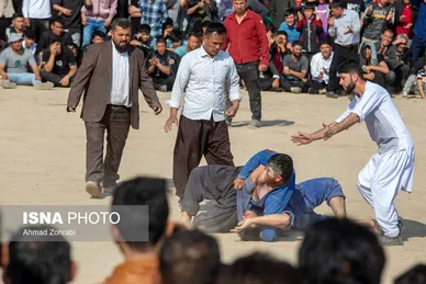 مسابقات کشتی سنتی افغانستانی‌ها به مناسبت نوروز در قم