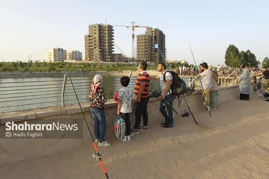 جشنواره ماهیگیری در رود پارک مشهد