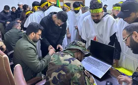عراقی&zwnj;ها برای عملیات استشهادی و دفاع از ایران کفن&zwnj; پوشیدند