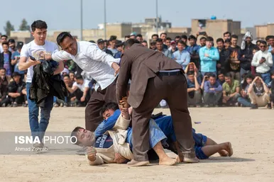 مسابقات کشتی سنتی افغانستانی‌ها به مناسبت نوروز در قم