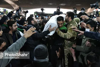 مراسم تدفین پیکر مطهر سه شهید گمنام در میدان شهدا مشهد