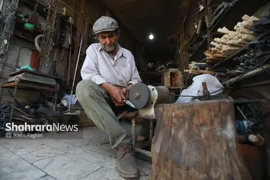 عزیزِ آهنگر