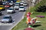 مشهد با نصب نماد‌ها و نشانه‌های هنری برای نوروز ۱۴۰۰ آماده می‌شود + تصاویر