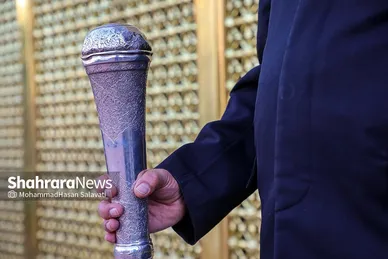 آئین اذن عزای حسینی و تعویض پرچم گنبد حرم مطهر رضوی
