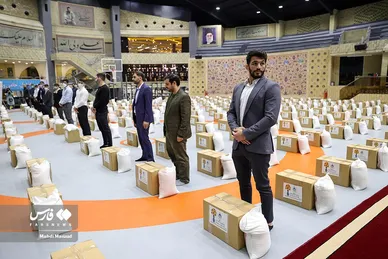 کمک مؤمنانه قهرمانان کشتی