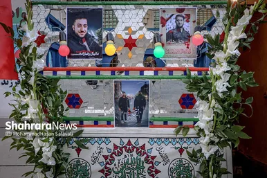 تجمع مردم در محل شهادت دو دانشجوی بسیجی در خیابان حر عاملی