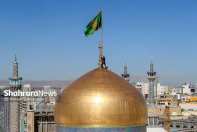 مراسم تعویض پرچم گنبد و پوش ضریح حرم مطهر ثامن الحجج (ع)
