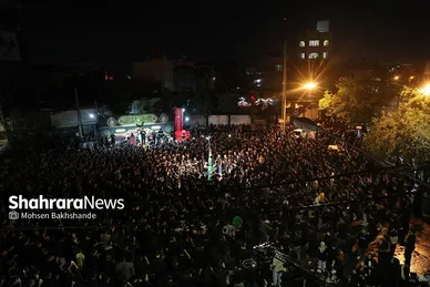 عکس‌هایی از مراسم علم کشیِ مهاجران افغانستانی در گلشهر مشهد