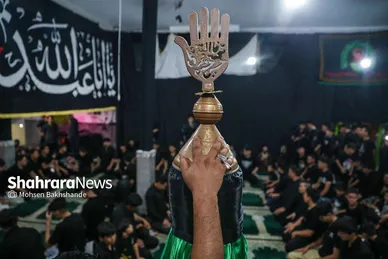 عکس‌هایی از مراسم علم کشیِ مهاجران افغانستانی در گلشهر مشهد