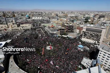 گزارش تصویری رویترز از مراسم باشکوه تشییع و خاکسپاری رهبر شهید در مشهد