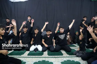 عکس‌هایی از مراسم علم کشیِ مهاجران افغانستانی در گلشهر مشهد