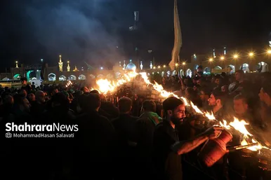 تصاویری از آئین سنتی مشعل گردانی نجفی‌های مقیم مشهد