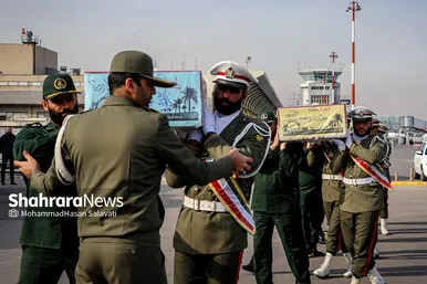 استقبال از پیکر مطهر ۱۲ شهید گمنام دفاع مقدس در فرودگاه هاشمی نژاد مشهد